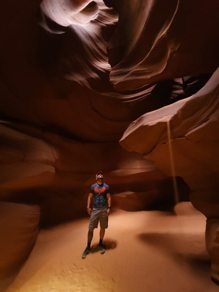 Anthony Guglielmo in a rock formation